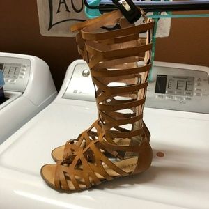 Report gladiator sandals